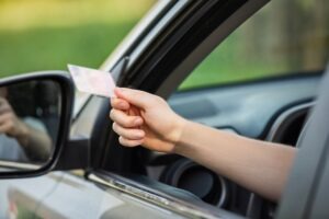 drunk driver handing over license