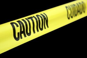 caution tape across a property
