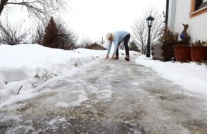 person slipping on icy sidewalk