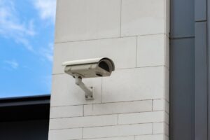 A security camera shooting video surveillance that can be used in an injury case.