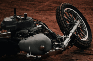 A motorcycle lying on the ground after an accident, resulting in a Vegas bike crash claim.
