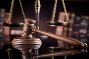 A gavel in front of the scales of justice. What evidence do you need for sexual assault?