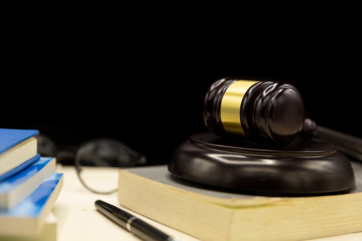 A gavel and law books.
