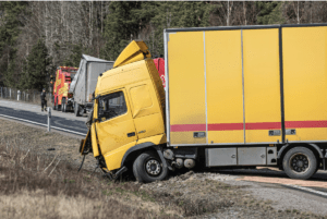 Truck accident on the side of the road.