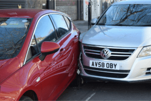 Two cars in a rear-ended accident.
